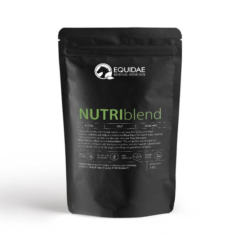 Large bag of NUTRIblend horse vitamin and mineral supplement being fed to horses to give them a shiny coat